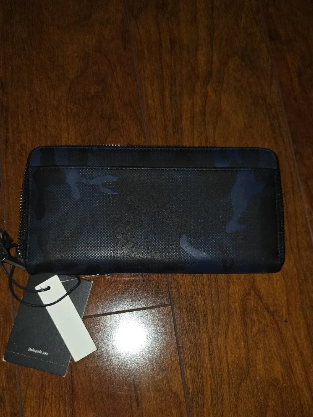 Jack Spade own this